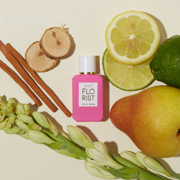 Florist 7.5ml Eau De Parfum Mini Dabber on off white background with lime, lemon, bergamot, pear, white and green flower, sandalwood, and cedarwood.