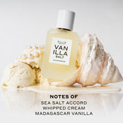 Vanilla Salt 50ml Eau De Parfum resting on white shell in melted vanilla ice cream next to scoops of vanilla ice cream and pearls on white background above black text that reads "Notes Of Sea Salt Accord, Whipped Cream, Madagascar Vanilla".